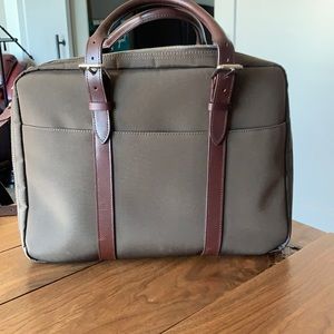 Gently used Stuart & Lau Briefcase